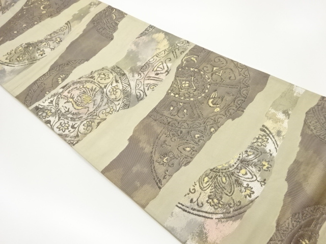 変わり横縞に丸文・鳥・唐草模様織出し袋帯